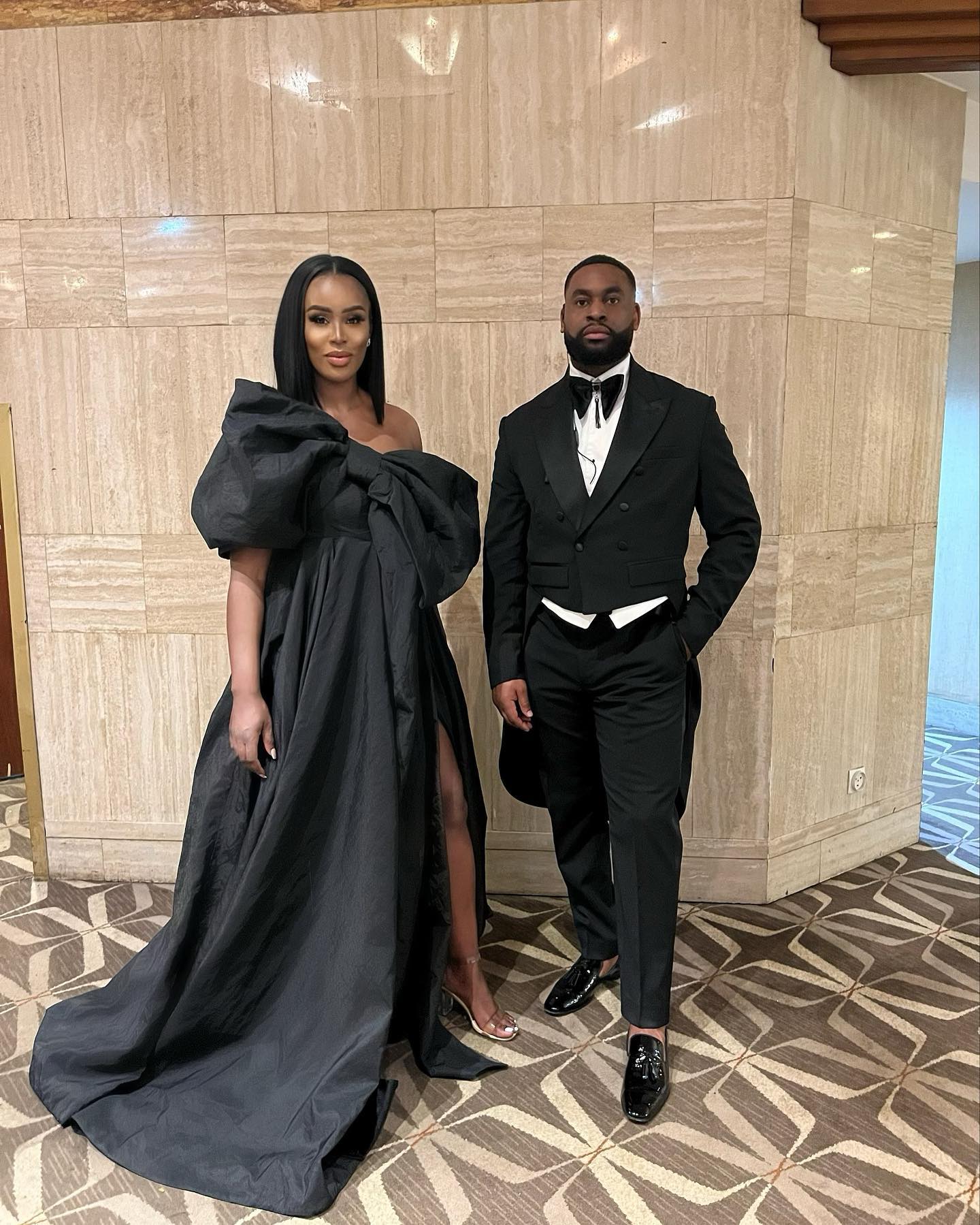 Black-tie couple at a luxury private event